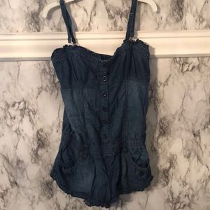Woman’s adjustable strap short romper with button down front size Medium